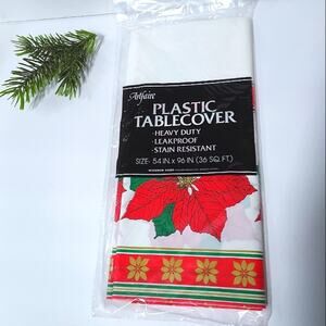 Vintage 80s New in Package Christmas Table Cloth plastic poinsettia 54" x 96"